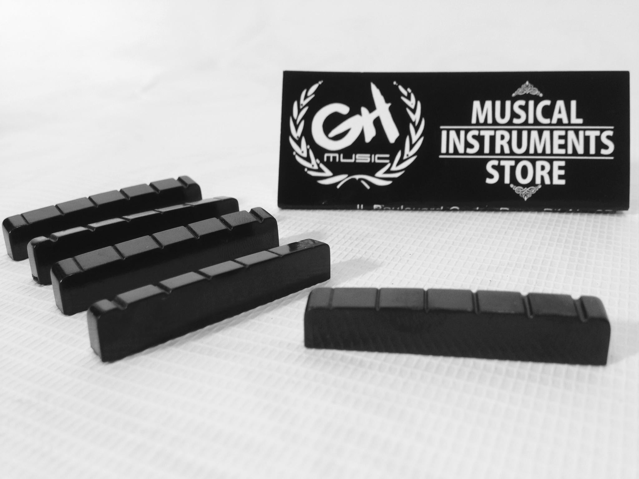 GUITAR NUT BLACK STRINGS